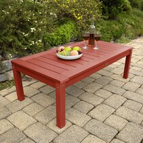 Red plastic store outdoor side table